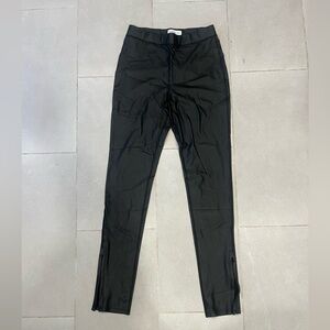 Something Navy black faux leather leggings with split hem. Size Medium